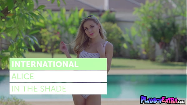 Skinny big boobed blonde teen Alice taking off her white polkadot bikini